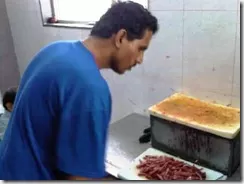 One of the guys at Meghna chops my meat